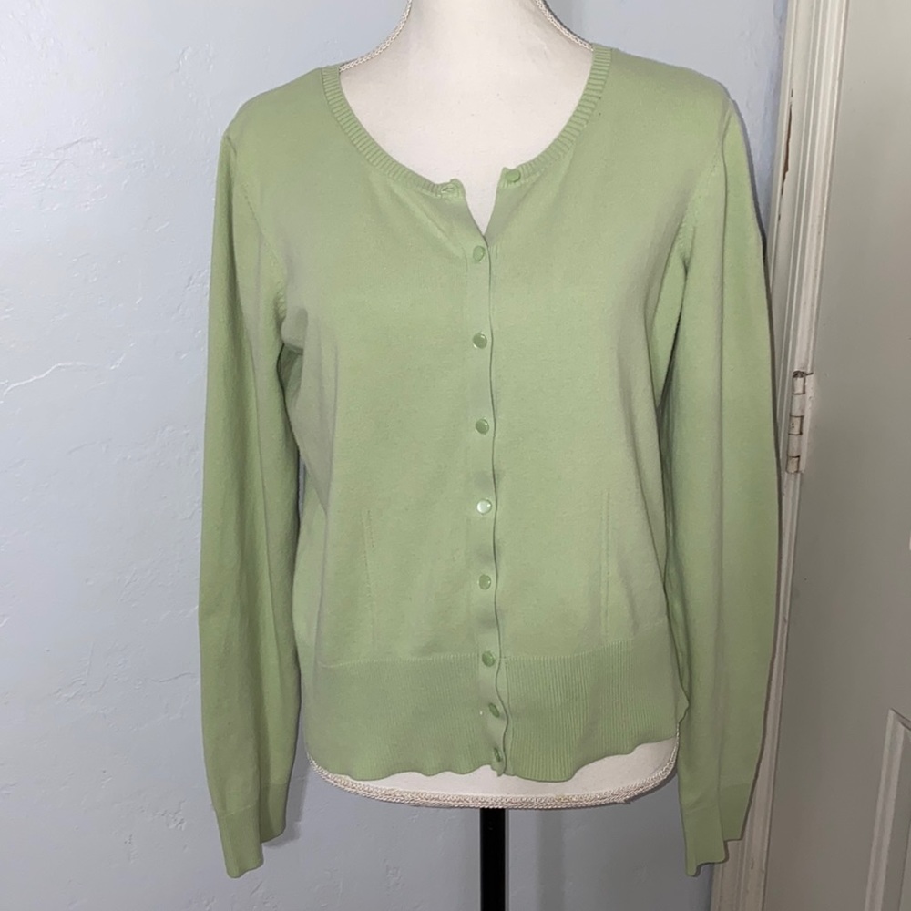 Light green cardigan sweater